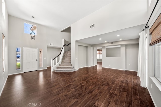 45114 Via Quivera, Temecula, CA 92592 - entryway with a towering ceiling, wood finished floors, and stairs