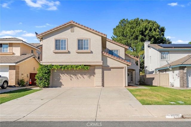 45114 Via Quivera, Temecula, CA 92592 - mediterranean / spanish-style home with a tile roof, concrete driveway, stucco siding, and a garage
