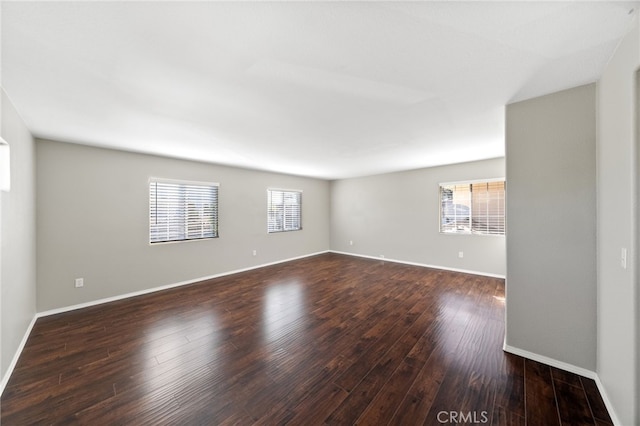 45114 Via Quivera, Temecula, CA 92592 - spare room featuring healthy amount of natural light and wood finished floors