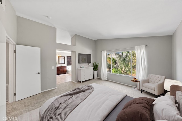 45114 Via Quivera, Temecula, CA 92592 - bedroom with light carpet, lofted ceiling, and ensuite bathroom