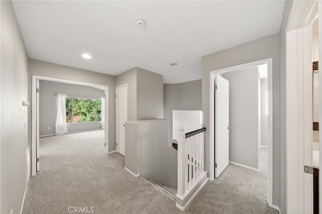 45114 Via Quivera, Temecula, CA 92592 - corridor with an upstairs landing, carpet floors, and recessed lighting