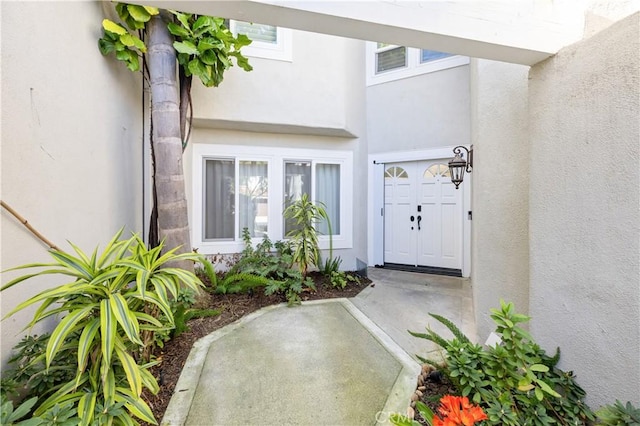 6 Baristo Unit 39, Irvine, CA 92612 - doorway to property featuring stucco siding
