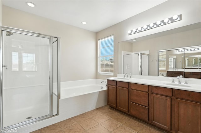 31969 Frontier Manor St, Menifee, CA 92584 - full bathroom with double vanity, a garden tub, a stall shower, and tile patterned flooring