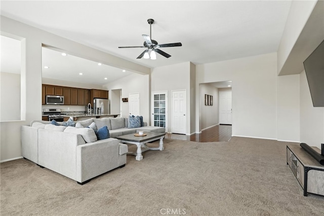 31969 Frontier Manor St, Menifee, CA 92584 - carpeted living room featuring ceiling fan, vaulted ceiling, and recessed lighting