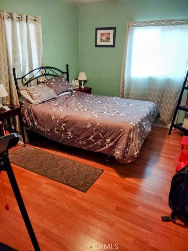 9778 Sharon Ave, Riverside, CA 92503 - bedroom featuring wood finished floors