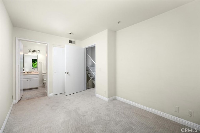 222 S Catalina Ave Unit 8, Pasadena, CA 91106 - unfurnished bedroom featuring light carpet and ensuite bathroom