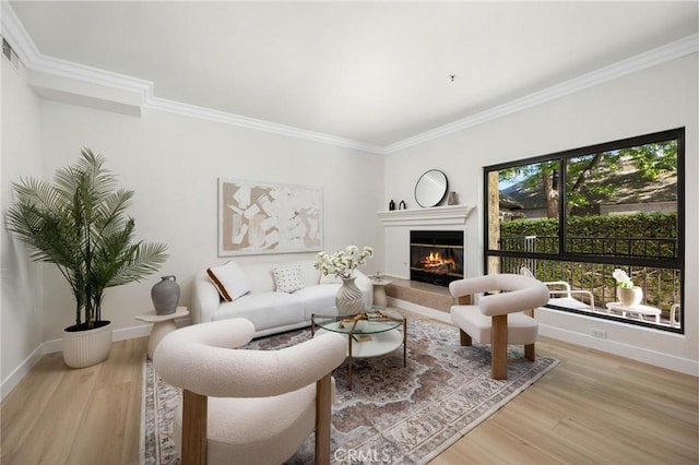 222 S Catalina Ave Unit 8, Pasadena, CA 91106 - living room with ornamental molding, wood finished floors, and a glass covered fireplace