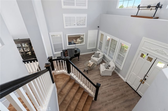 611 Del Dios, San Clemente, CA 92672 - entryway featuring a towering ceiling, dark wood-type flooring, and stairs