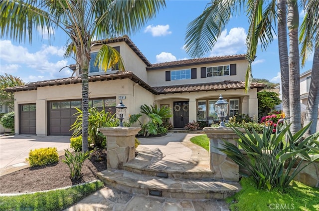 611 Del Dios, San Clemente, CA 92672 - mediterranean / spanish-style home featuring stucco siding, driveway, a tile roof, and a garage