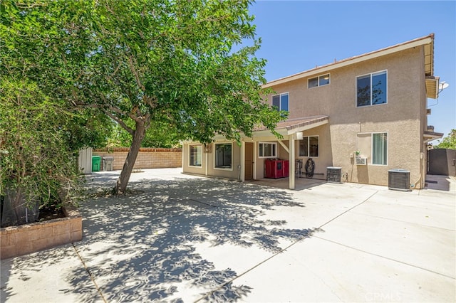 5808 Monterey Pl, Palmdale, CA 93552 - rear view of property with stucco siding, a patio, and a fenced backyard