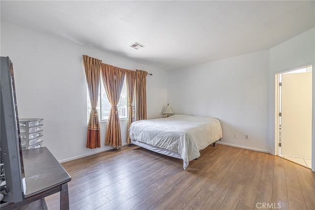 5808 Monterey Pl, Palmdale, CA 93552 - bedroom with wood-type flooring