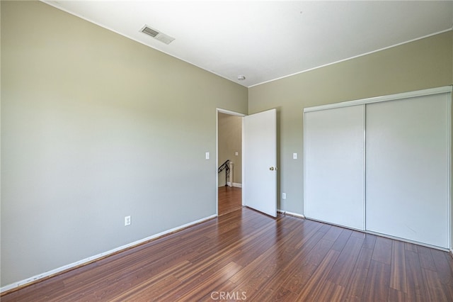 5808 Monterey Pl, Palmdale, CA 93552 - unfurnished bedroom with wood finished floors and a closet