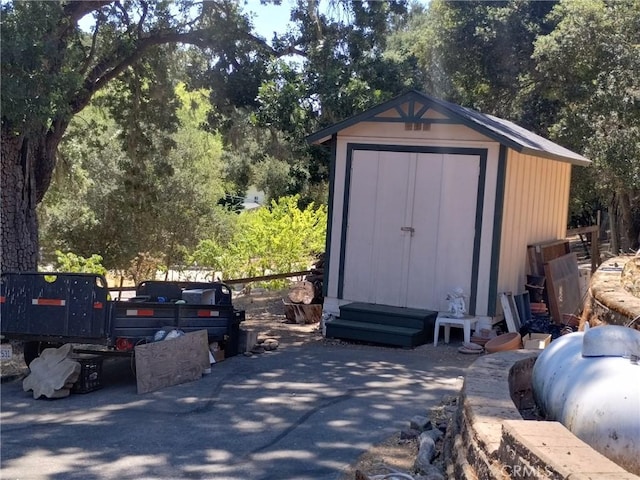 13205 Santa Lucia Rd, Atascadero, CA 93422 - view of shed with view of wooded area