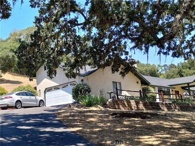 13205 Santa Lucia Rd, Atascadero, CA 93422 - view of front of property featuring stucco siding and driveway