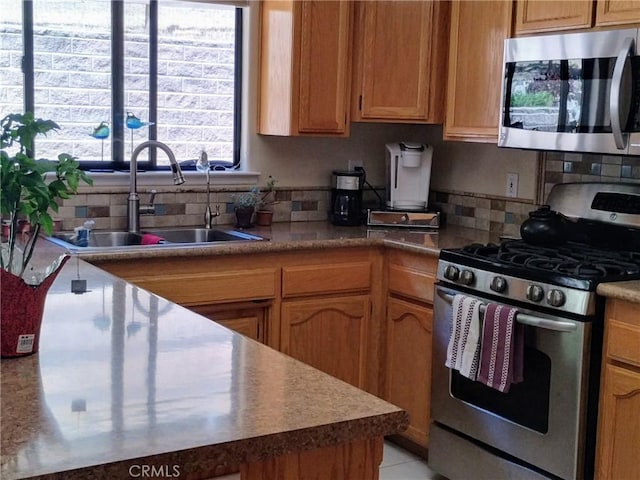 13205 Santa Lucia Rd, Atascadero, CA 93422 - kitchen with appliances with stainless steel finishes, backsplash, and brown cabinets