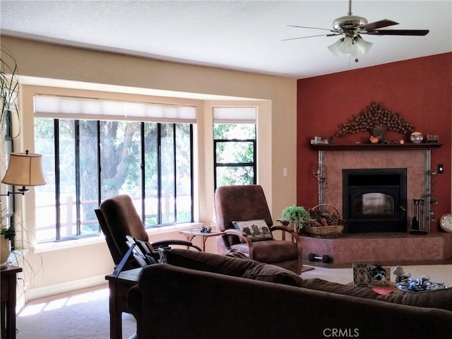 13205 Santa Lucia Rd, Atascadero, CA 93422 - living room with plenty of natural light, carpet, a tile fireplace, and a ceiling fan