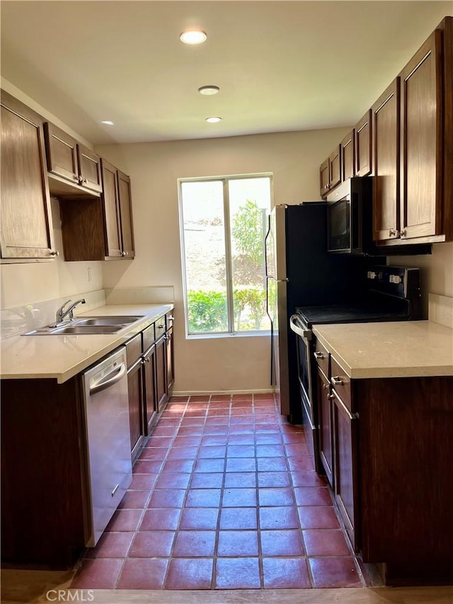 5800 Kanan Rd Unit 167, Agoura Hills, CA 91301 - kitchen featuring stainless steel appliances, recessed lighting, light countertops, and dark tile patterned flooring