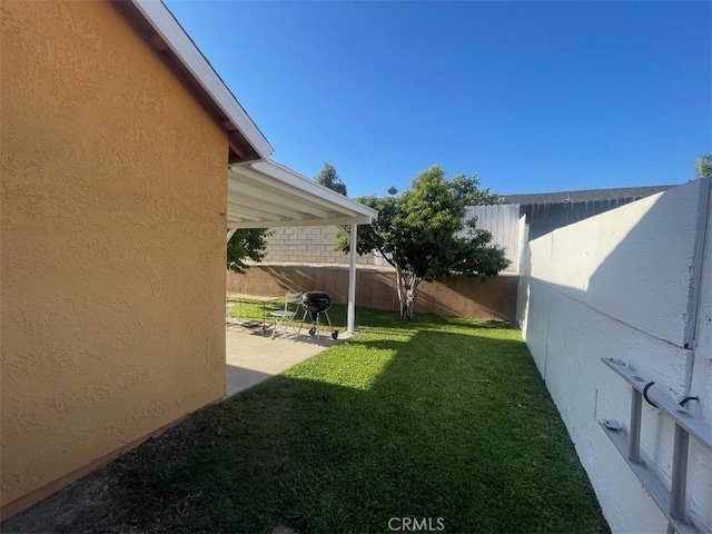 14194 Old Field Ave, Fontana, CA 92337 - fenced backyard with a patio