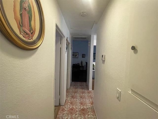 14194 Old Field Ave, Fontana, CA 92337 - hall featuring a textured wall and light tile patterned floors