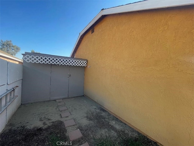 14194 Old Field Ave, Fontana, CA 92337 - view of side of home with stucco siding