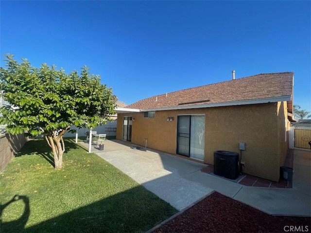 14194 Old Field Ave, Fontana, CA 92337 - back of property with stucco siding, a fenced backyard, a patio, and roof with shingles