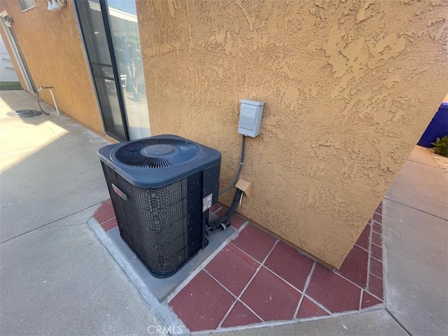 14194 Old Field Ave, Fontana, CA 92337 - exterior view of stucco siding and a wood stove
