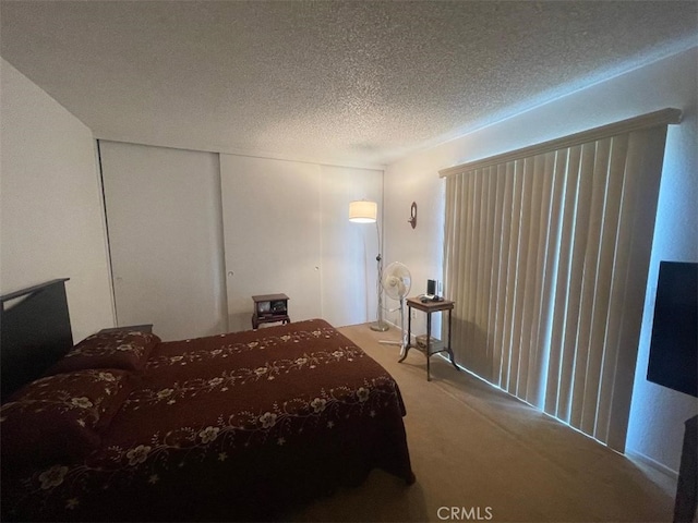 14194 Old Field Ave, Fontana, CA 92337 - bedroom featuring carpet, a textured ceiling, and a closet