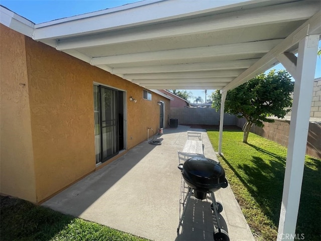 14194 Old Field Ave, Fontana, CA 92337 - fenced backyard with a patio and a grill