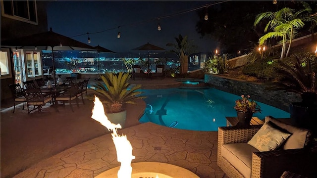 28606 Vista Ladera, Laguna Niguel, CA 92677 - pool at twilight featuring an outdoor pool, a patio, and an in-ground hot tub