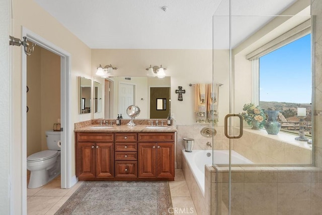 28606 Vista Ladera, Laguna Niguel, CA 92677 - full bathroom with tile patterned floors, a relaxing tiled tub, double vanity, and a shower with shower door