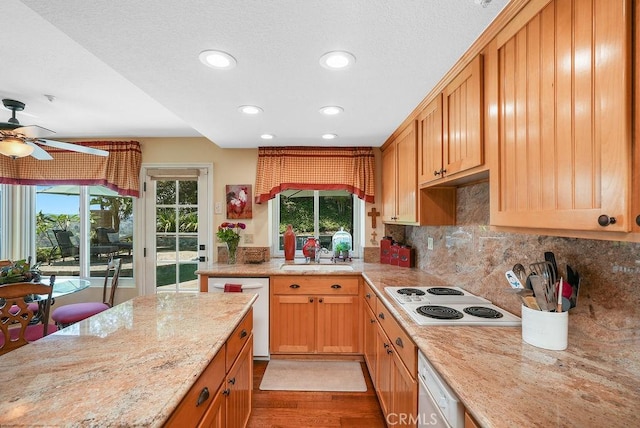 28606 Vista Ladera, Laguna Niguel, CA 92677 - kitchen with white appliances, a ceiling fan, recessed lighting, wood finished floors, and tasteful backsplash
