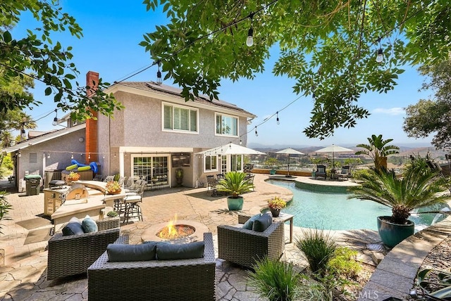 28606 Vista Ladera, Laguna Niguel, CA 92677 - swimming pool featuring area for grilling, a patio, and an outdoor living space with a fire pit
