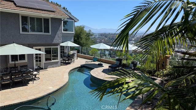 28606 Vista Ladera, Laguna Niguel, CA 92677 - swimming pool with outdoor dining area, a mountain view, and a patio area