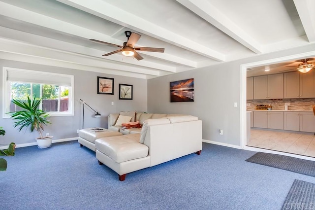 3018 Thunder Dr, Oceanside, CA 92056 - living area featuring a ceiling fan, carpet floors, and beam ceiling