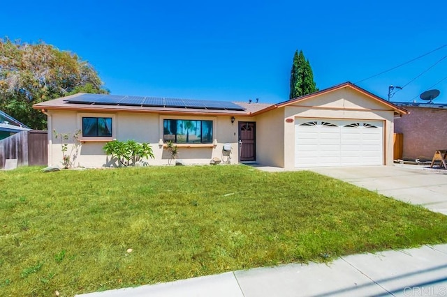 3018 Thunder Dr, Oceanside, CA 92056 - ranch-style house featuring stucco siding, a garage, driveway, and roof mounted solar panels
