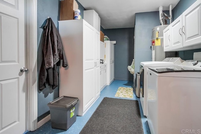 3018 Thunder Dr, Oceanside, CA 92056 - washroom with cabinet space, separate washer and dryer, and electric water heater