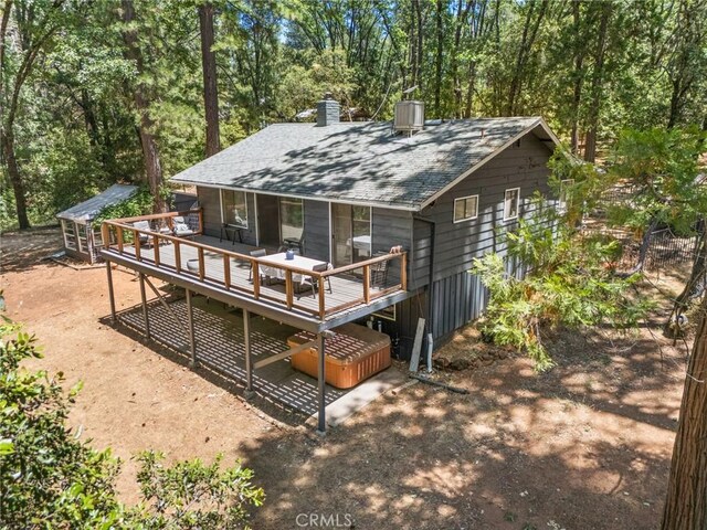 4934 Tippitoe Ln, Forest Ranch, CA 95942 - back of house with a deck, a chimney, and roof with shingles
