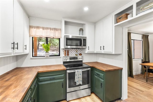 4934 Tippitoe Ln, Forest Ranch, CA 95942 - kitchen with wood counters, stainless steel appliances, green cabinetry, and recessed lighting