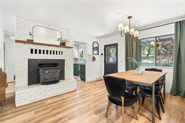 4934 Tippitoe Ln, Forest Ranch, CA 95942 - dining room with light wood-type flooring and a chandelier