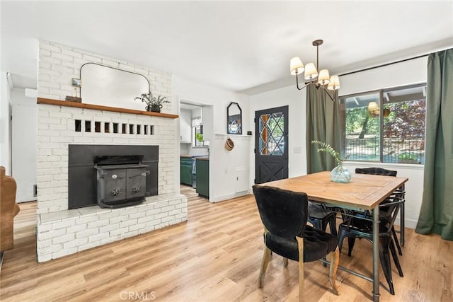 4934 Tippitoe Ln, Forest Ranch, CA 95942 - dining space with light wood finished floors and a chandelier
