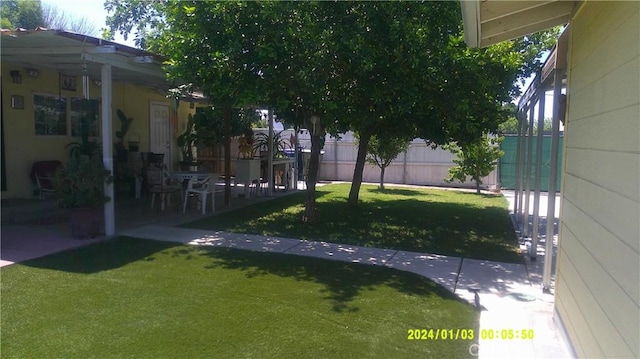 1033 Chapel Dr, Bakersfield, CA 93304 - view of yard with a patio