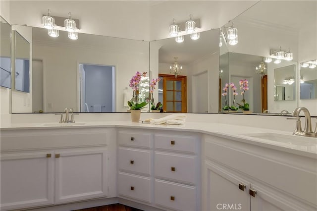 5534 Encino Ave Unit 211, Encino, CA 91316 - full bath with double vanity, ornamental molding, and a chandelier