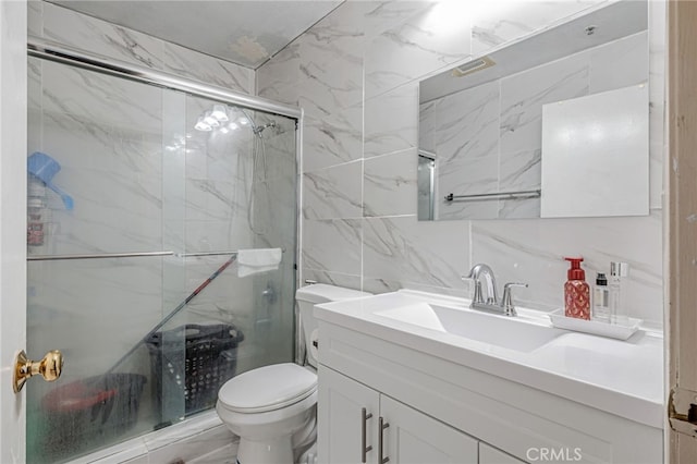 8828 Burnet Ave Unit 9, North Hills, CA 91343 - full bathroom featuring tile walls, vanity, and a marble finish shower