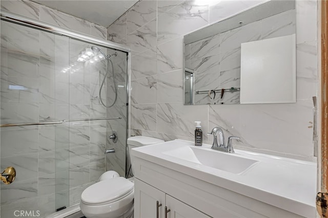 8828 Burnet Ave Unit 9, North Hills, CA 91343 - full bathroom featuring tile walls, vanity, a marble finish shower, and backsplash