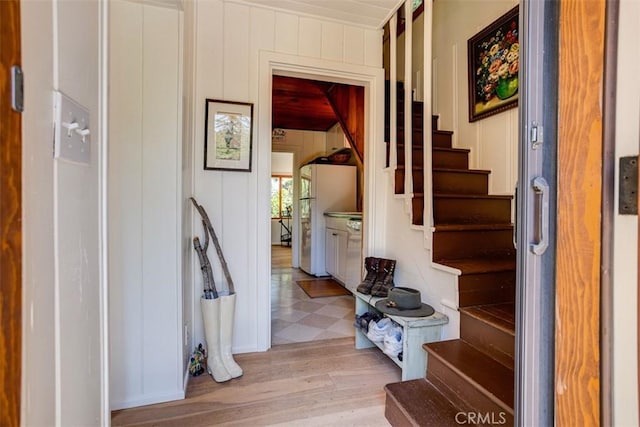 433 Milburn Rd, Lake Arrowhead, CA 92352 - entrance foyer with stairway and light wood-style floors