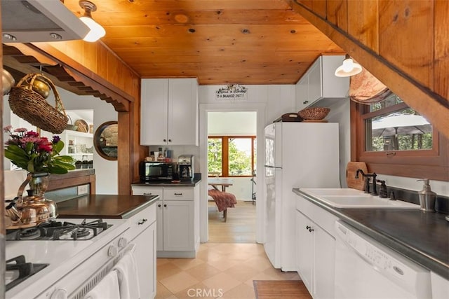 433 Milburn Rd, Lake Arrowhead, CA 92352 - kitchen featuring white appliances, wood ceiling, dark countertops, white cabinets, and light floors
