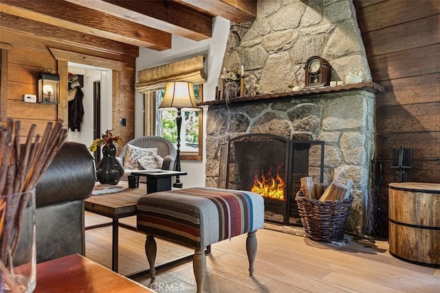 433 Milburn Rd, Lake Arrowhead, CA 92352 - living area featuring hardwood / wood-style flooring, beam ceiling, a fireplace, and wooden walls