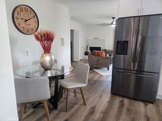1201 W 186th St, Gardena, CA 90248 - dining space featuring dark wood-style floors, a high end fireplace, and ceiling fan