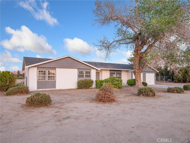 9383 11th Ave, Hesperia, CA 92345 - ranch-style house with concrete driveway and stucco siding