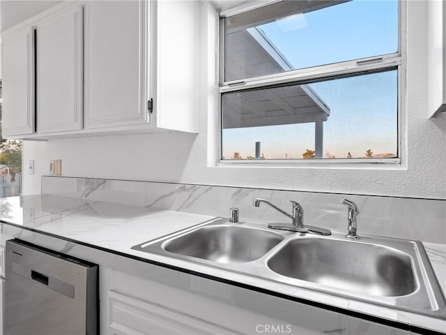 9383 11th Ave, Hesperia, CA 92345 - kitchen with stainless steel dishwasher and white cabinets